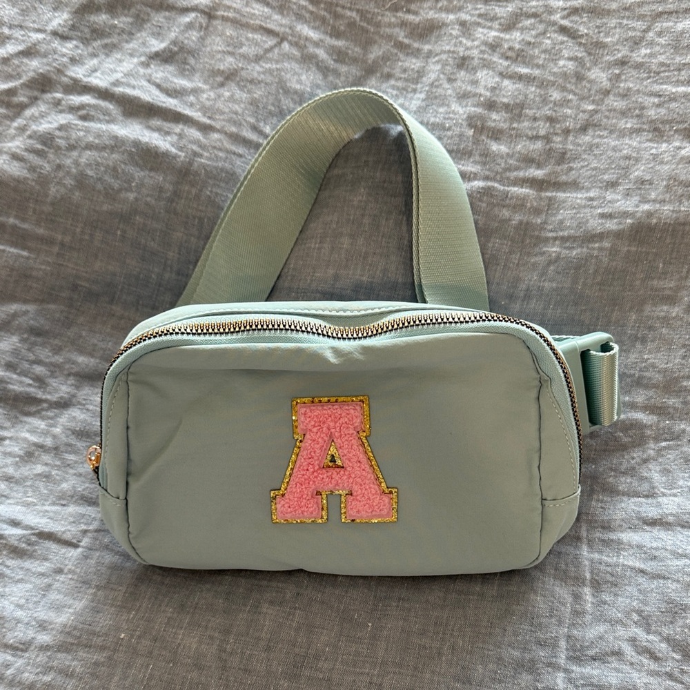 NWOT Light Blue Cross-body belt bag with pink A
